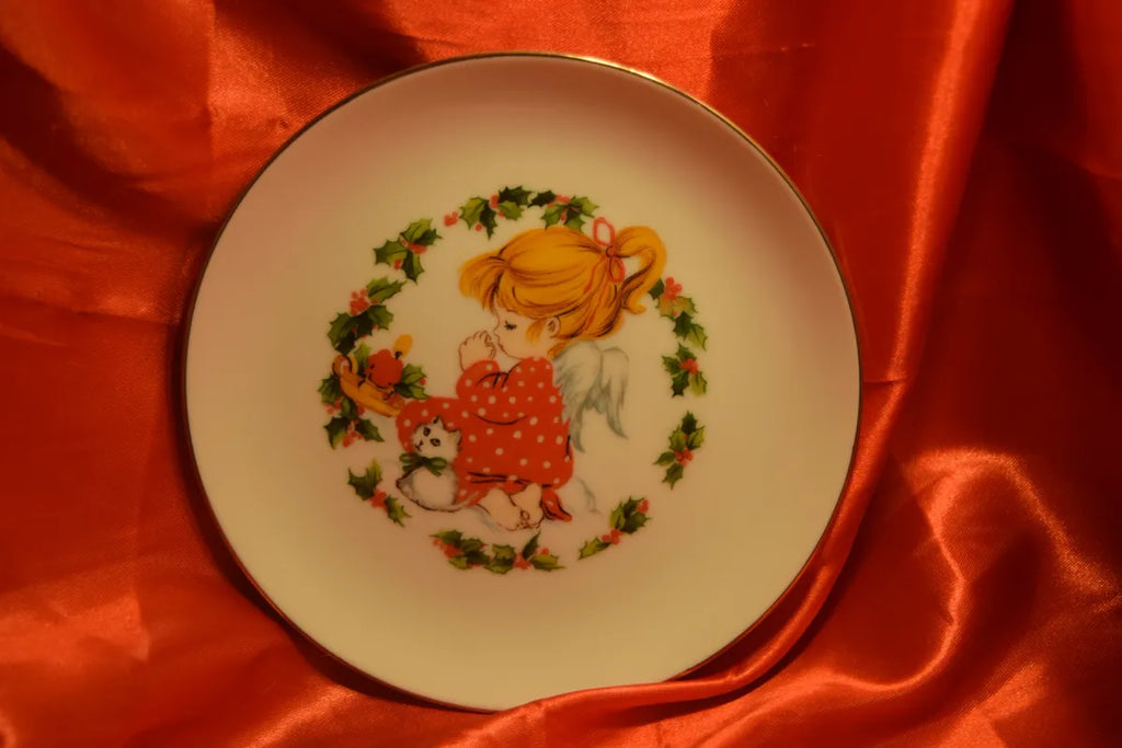 "Little girl praying with her Kitten"Collectors Plate